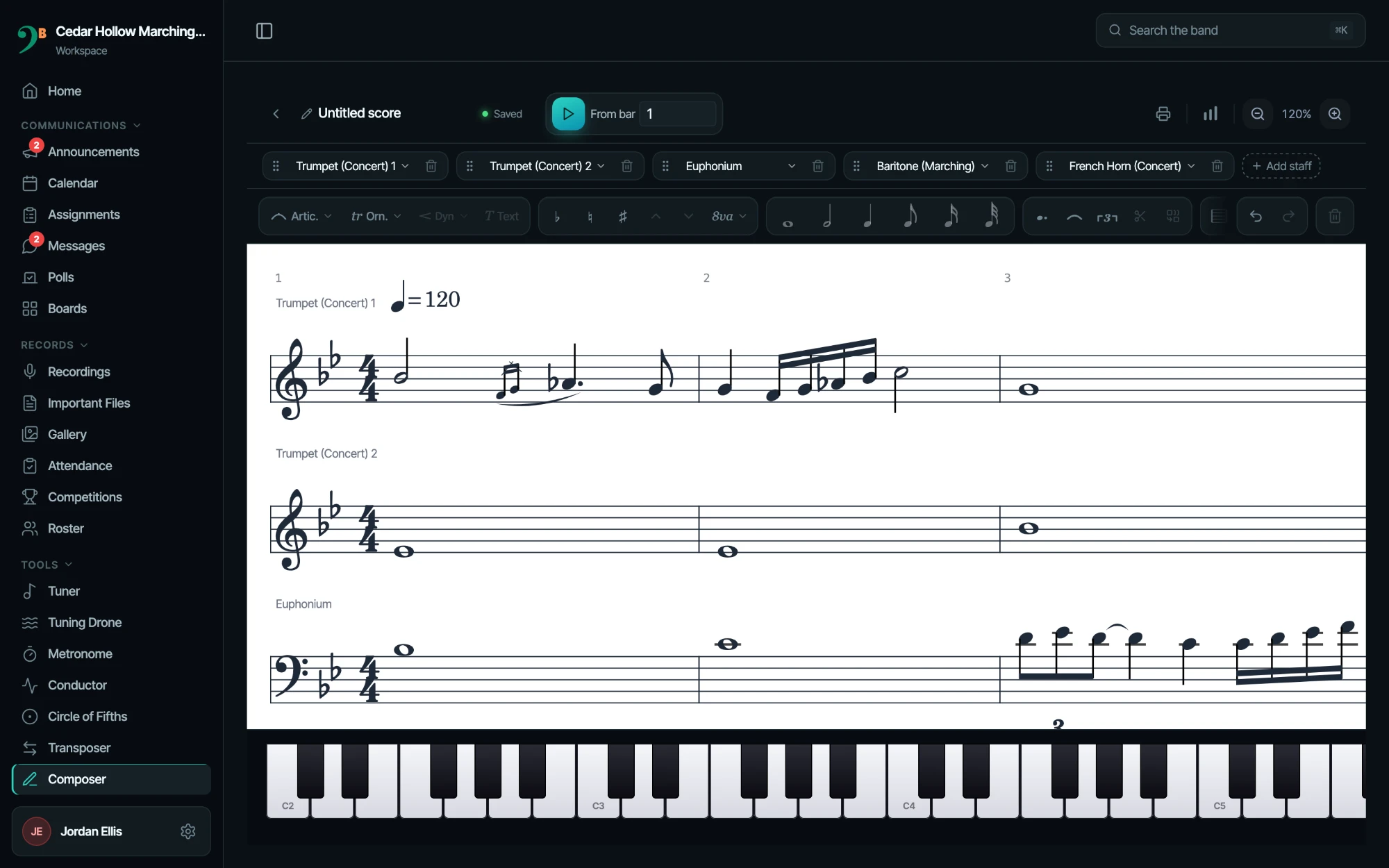 The ClefBoard composer on a laptop: a brass score with trumpet, euphonium, baritone and French horn staves, grace notes, slurs and a piano keyboard for input.